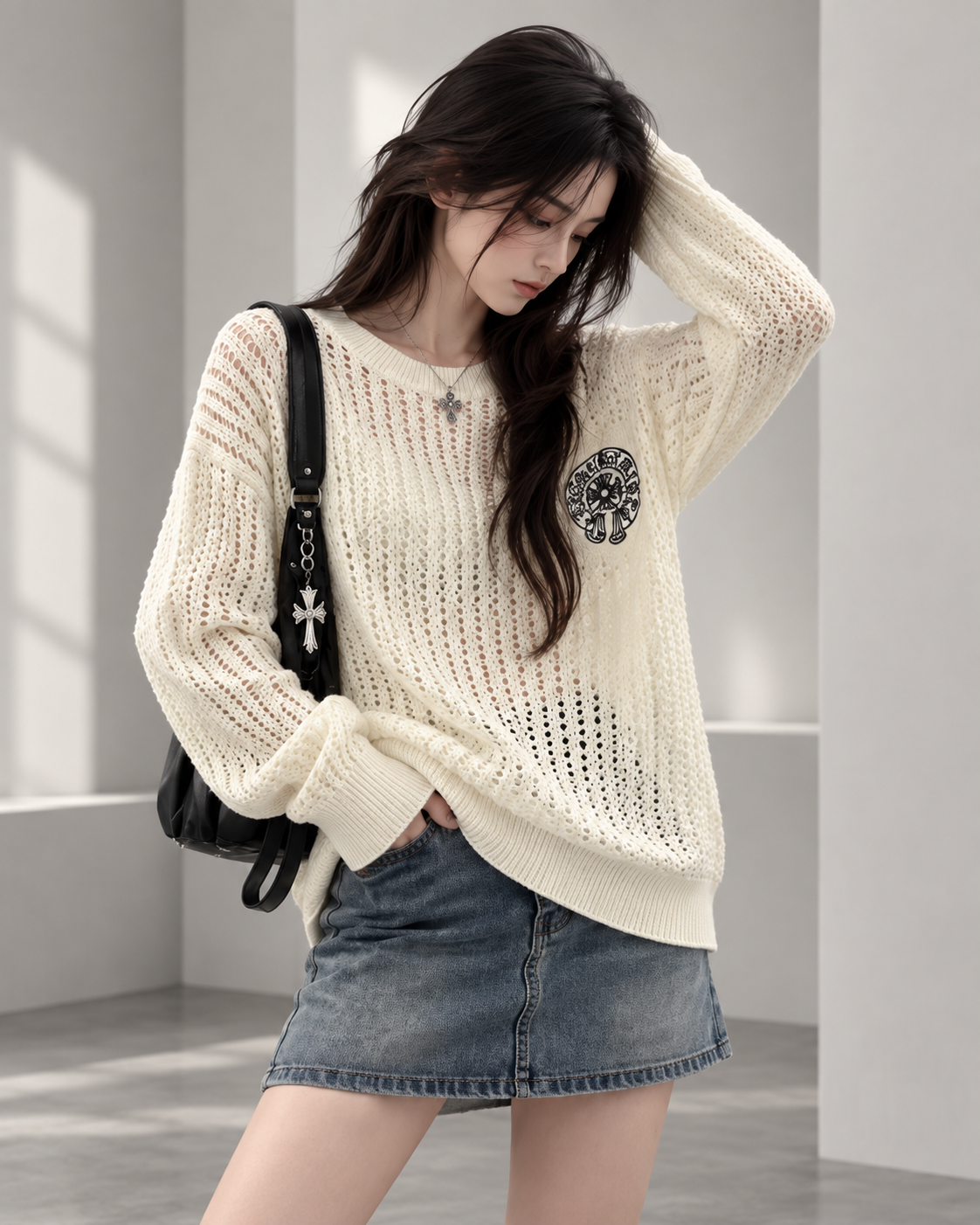 Knitwear category — model in cream open-knit sweater